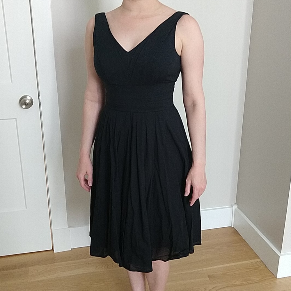 Black pleated fit and flare dress